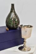 A BOXED SILVER GOBLET AND A SILVER LINED GLASS BOTTLE, silver goblet of a plain polished design,