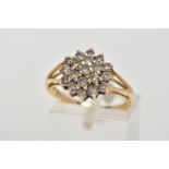AN 18CT GOLD DIAMOND CLUSTER RING, designed with claw set, round brilliant cut diamonds, stamped