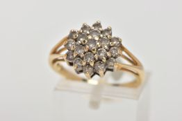 AN 18CT GOLD DIAMOND CLUSTER RING, designed with claw set, round brilliant cut diamonds, stamped