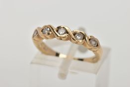 A 9CT GOLD DIAMOND HALF ETERNITY RING, designed with a row of five round brilliant cut diamonds,