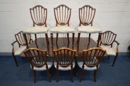 A MAHOGANY TWIN PEDESTAL DINING TABLE, with one additional leaf, extended length 184cm x closed