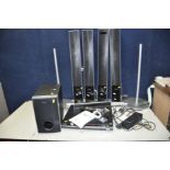 A SONY DAV-DZ830W DVD HOME THEATRE SYSTEM with two tall front speakers with stands (but no fixings