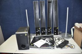 A SONY DAV-DZ830W DVD HOME THEATRE SYSTEM with two tall front speakers with stands (but no fixings