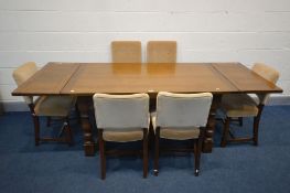 A REPRODUCTION OAK DRAW LEAF TABLE with a shaped stretcher, open length 229cm x closed length