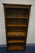 AN OLD CHARM OAK OPEN BOOKCASE with three adjustable shelves, width 77cm x depth 28cm x height