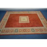 A MODERN FLORAL CARPET 294cm x 201cm (condition - some damage and stains)
