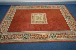 A MODERN FLORAL CARPET 294cm x 201cm (condition - some damage and stains)