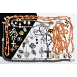 A BAG OF ASSORTED COSTUME JEWELLERY, to include beaded necklaces, non-pierced earrings, white