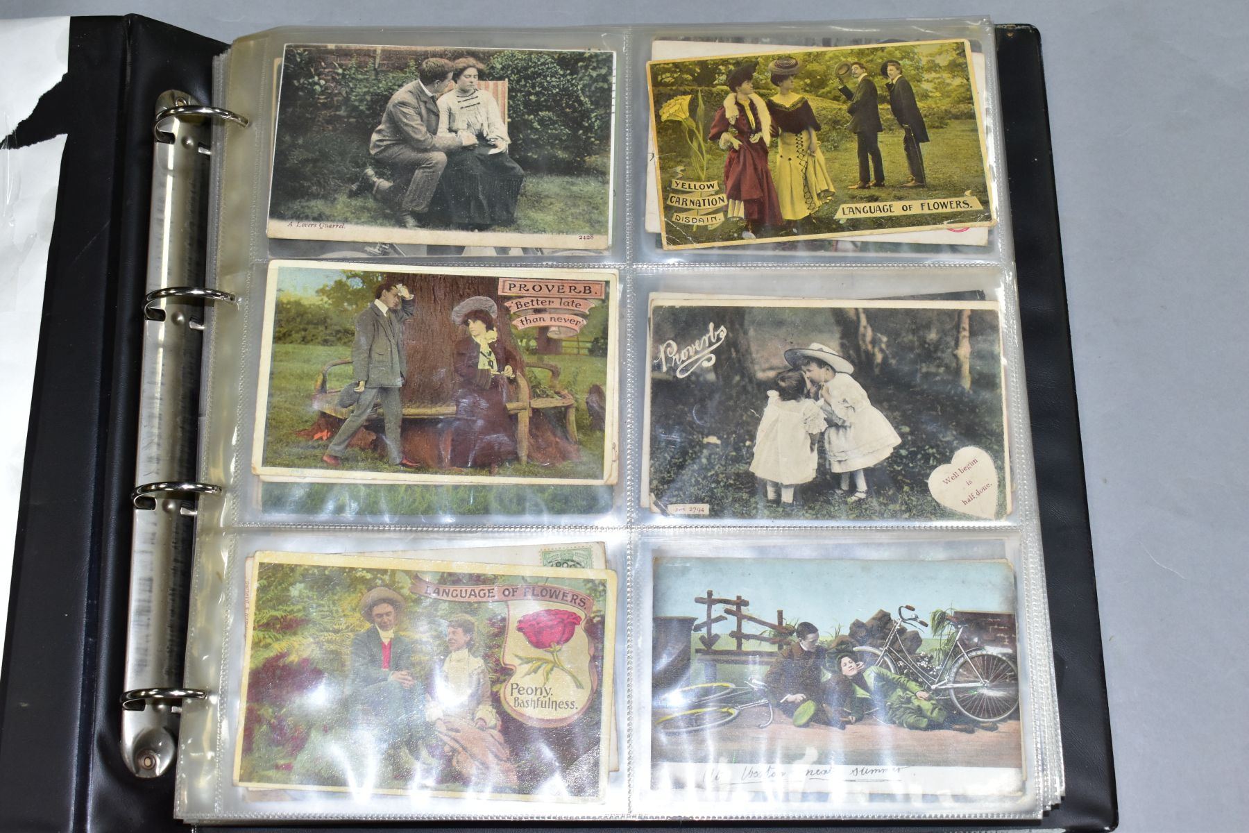 POSTCARDS, approximately 405 postcards in one album, featuring early 20th century examples depicting