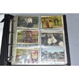 POSTCARDS, approximately 405 postcards in one album, featuring early 20th century examples depicting