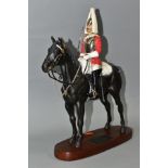 A BESWICK CONNOISSEUR MODEL 'LIFE GUARD' STYLE TWO (WITH SWORD), model no 2562, loose from plinth,