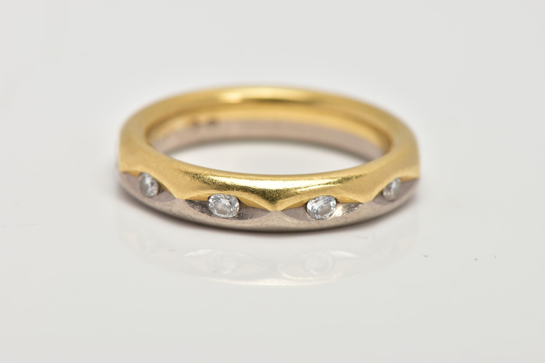 A FULL DIAMOND ETERNITY RING, the band designed with half yellow and half white colour metal, set - Image 2 of 3