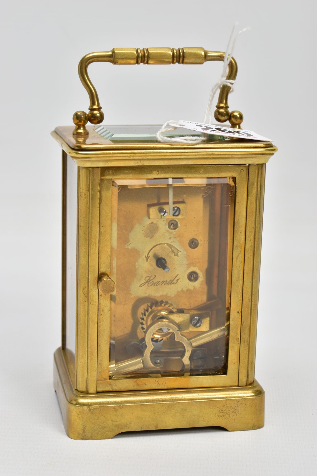 A BRASS CARRIAGE CLOCK, white dial, Roman numerals, blue hands, within a five glass panel - Image 4 of 6