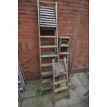 THREE WOODEN STEP LADDERS, the largest length at 230cm (3)