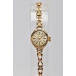 A LADIES 9CT GOLD 'AVIA' WRISTWATCH, hand wound movement, round silver dial signed 'Avia 17 jewels',