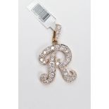 A 9CT GOLD CUBIC ZIRCONIA SET INITIAL 'R' PENDANT, large initial 'R' set with colourless cubic