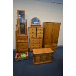 SEVEN VARIOUS PIECES OF PINE BEDROOM FURNITURE, to include a two door wardrobe, with two drawers,