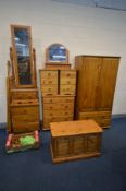 SEVEN VARIOUS PIECES OF PINE BEDROOM FURNITURE, to include a two door wardrobe, with two drawers,