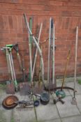 A COLLECTION OF GARDEN TOOLS to include forks, spades, hoe etc together with a small quantity of
