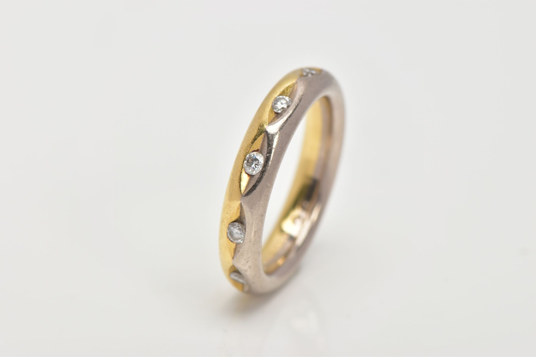 A FULL DIAMOND ETERNITY RING, the band designed with half yellow and half white colour metal, set - Image 3 of 3