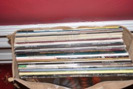 A BAG CONTAINING TWENTY NINE LPs OF ROCK MUSIC artists include Led Zepplin, Wishbone Ash, Black