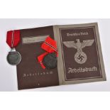 A GERMAN WW II ITEMS, to include a Third Reich era Arbeitsbuch (workbook) thirty eight page variety,