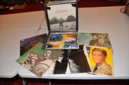 AN LP CASE CONTAINING TWENTY NINE LPs including All things must Pass by George Harrison, Sticky