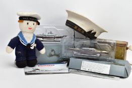 A BOX CONTAINING VARIOUS MILITARY ITEMS (NAVAL INTEREST), to include two De-agostini scale models of