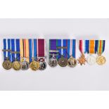 THREE MINIATURE GROUPS OF MEDALS, WW1 Trio on a bar (modern), QEII Nato Kosovo, Nato Non article