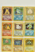 THE COMPLETE POKEMON CARD COLLECTIONS OF THE BASE SET, JUNGLE, FOSSIL, TEAM ROCKET SETS, each