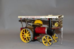 AN UNBOXED MAMOD LIVE STEAM SHOWMAN ENGINE, not tested, playworn condition and has been run, red,
