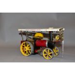 AN UNBOXED MAMOD LIVE STEAM SHOWMAN ENGINE, not tested, playworn condition and has been run, red,