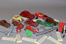 A QUANTITY OF UNBOXED AND ASSORTED EARLY POSTWAR DIECAST AND OTHER VEHICLES, to include Dinky Toys