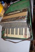 A MAZZINI ANTORIA GERMAN MADE PIANO ACCORDIAN with 34 keys and 48 buttons ( distressed with losses)