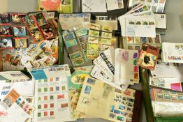 COLLECTION OF WORLDWIDE STAMPS IN ALBUM AND LOOSE, together with GB FDCS from 1970s-80s in two