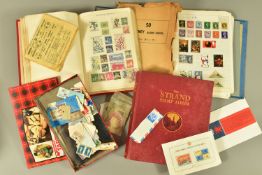 WORLDWIDE COLLECTION OF STAMPS IN THREE ALBUMS AND LOOSE IN A TIN