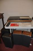 A BANG AND OLUFSEN BEOCENTRE 7000 VINTAGE MUSIC CENTRE with a pair of X35 speakers (working) a