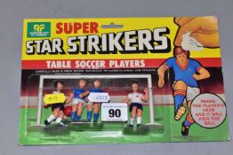 A BLISTER PACK CONTAINING GOODTIME TOYS BY CHARBENS SUPER STAR STRIKERS TABLE TOP SOCCER PLAYERS,