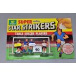 A BLISTER PACK CONTAINING GOODTIME TOYS BY CHARBENS SUPER STAR STRIKERS TABLE TOP SOCCER PLAYERS,