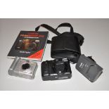 A CANON G12 DIGITAL CAMERA with charger, one battery and user guide along with a Powershot A85