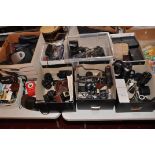 EIGHT TRAYS CONTAINING VINTAGE CAMERAS AND EQUIPMENT including a Cosina CS-1, a Cosins CS-3, a