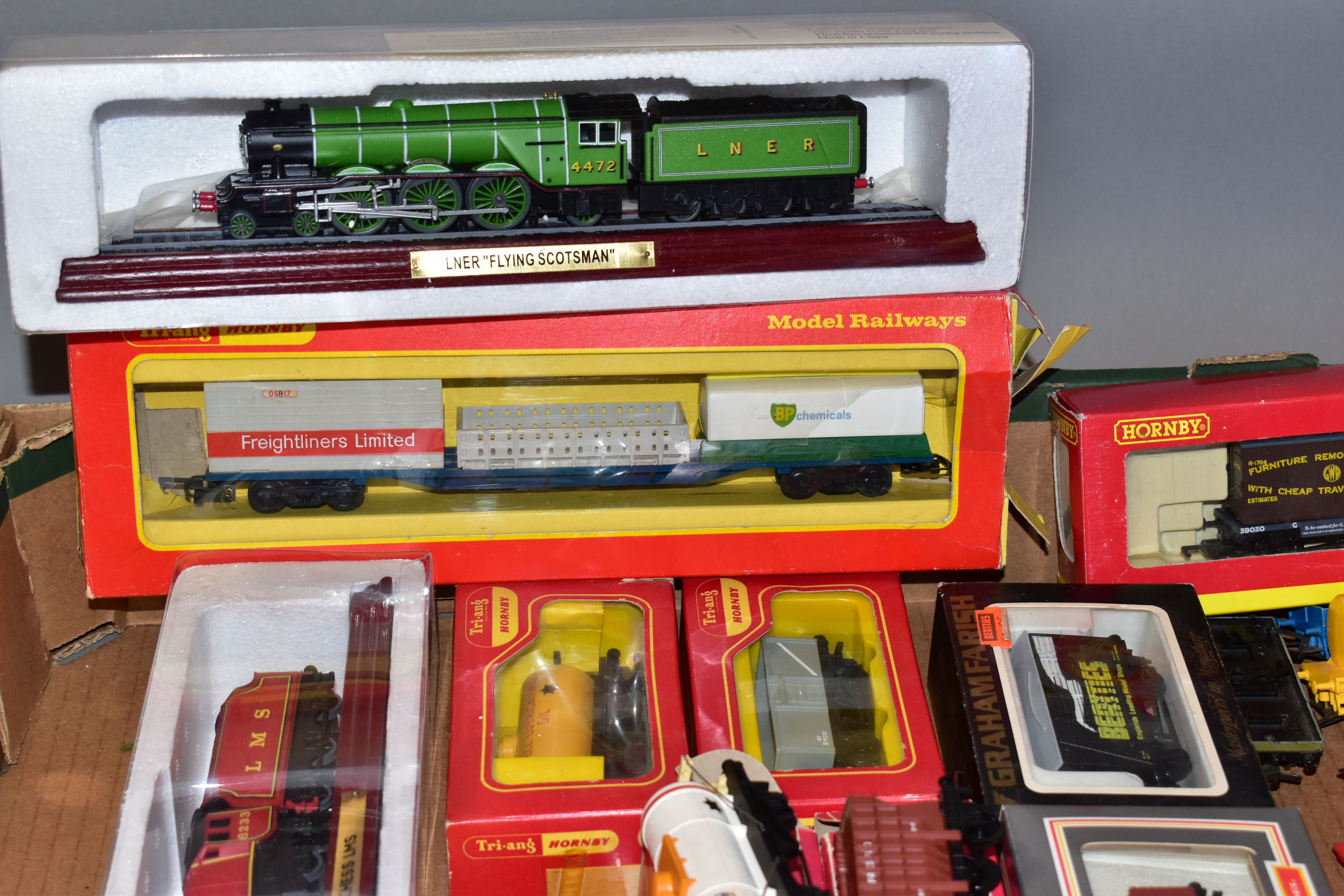 A QUANTITY OF BOXED AND UNBOXED OO/HO GAUGE LOCOMOTIVES AND ROLLING STOCK, locomotives are Tri- - Image 3 of 4