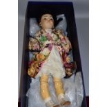 A LARGE SIMON & HALBIG BISQUE HEAD ORIENTAL STYLE CHILD DOLL, back of neck marked 'Germany Simon &