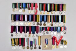 A LARGE NUMBER OF MINIATURE MEDALS, over fifty examples ranging from Victorian to the present day,