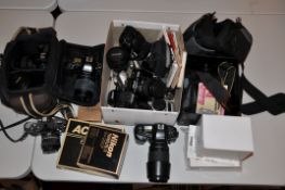 A COLLECTION OF NIKON CAMERAS AND EQUIPMENT including a D70, a F65 a F90X, a DX 55-200mm lens, an AK