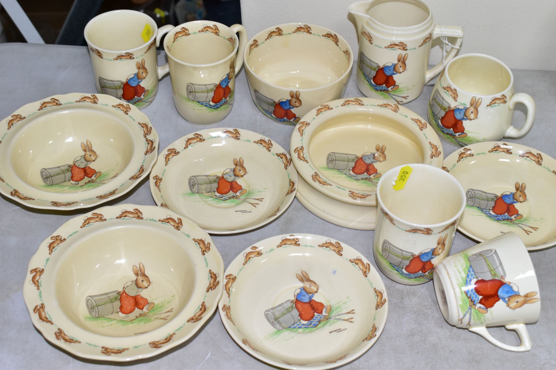 THIRTEEN PIECES OF ROYAL DOULTON BUNNYKINS EARTHENWARE TABLEWARES OF PRESSING TROUSERS SCENE HW14 BY