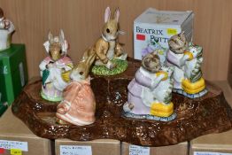 FIVE BESWICK BEATRIX POTTER FIGURES BP3C AND A BESWICK DISPLAY STAND No 2295, comprising Benjamin