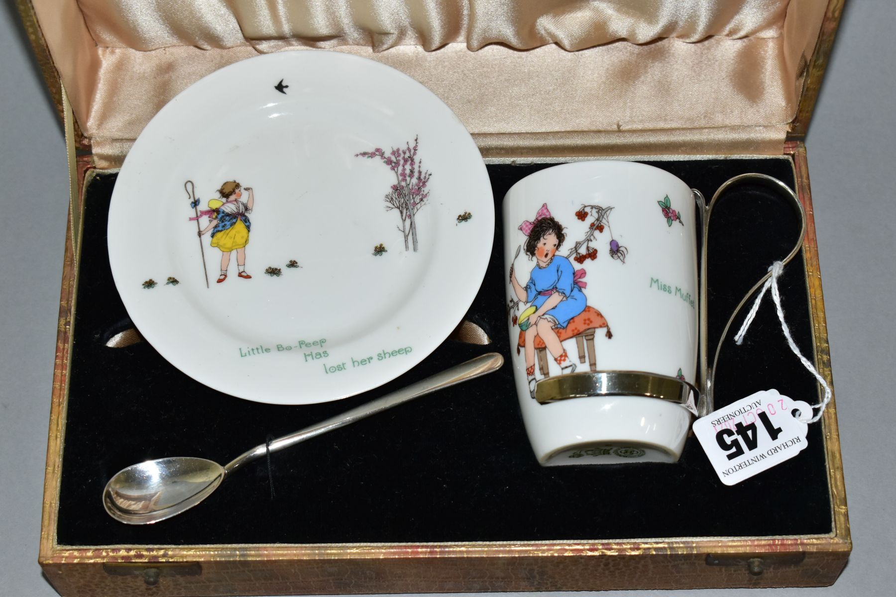 A CASED TWO PIECE ROYAL DOULTON CHINA NURSERY RYHYMES L SERIES WARE TEA SET, comprising burke beaker