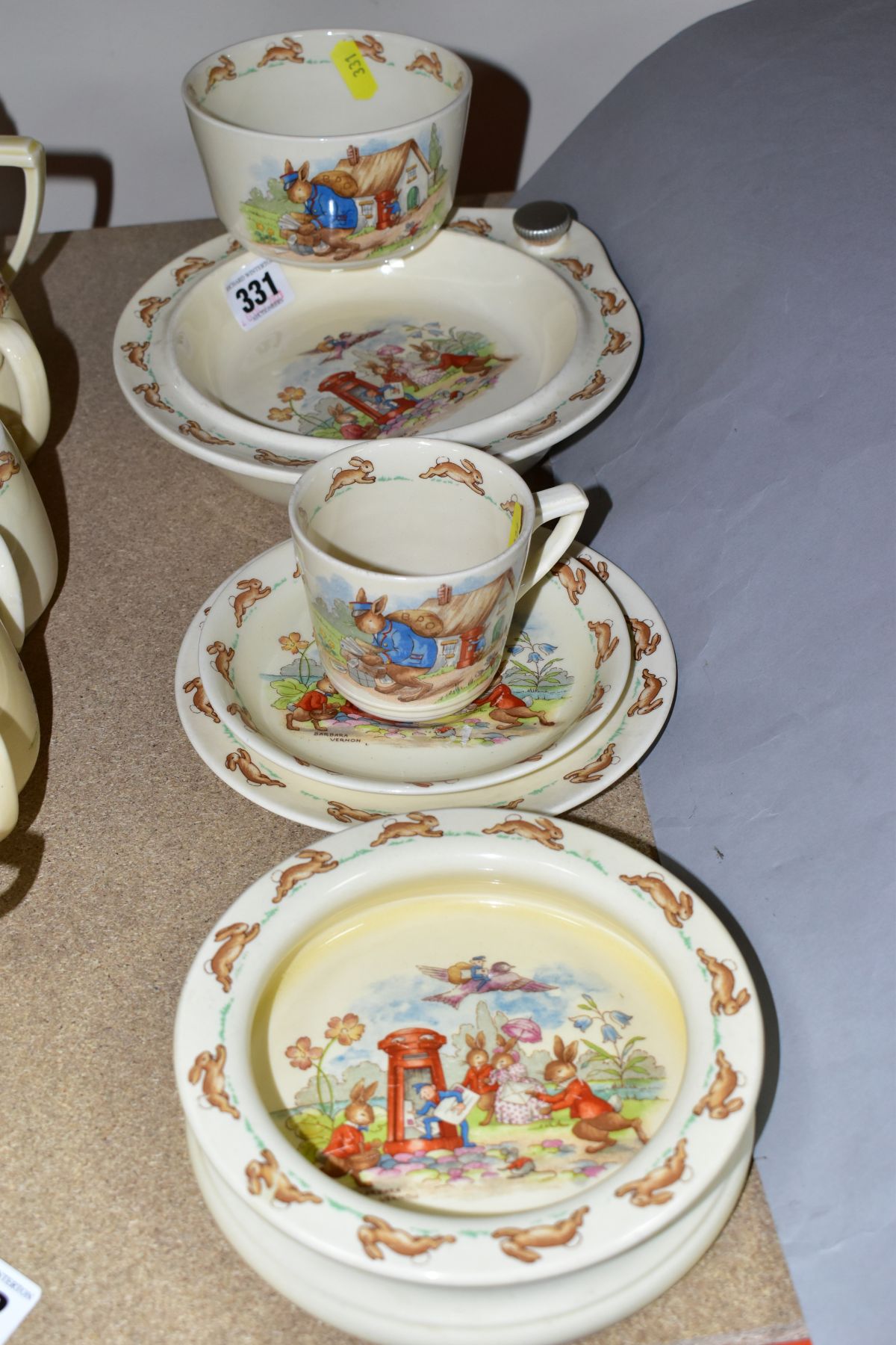 SIX PIECES OF ROYAL DOULTON BUNNYKINS EARTHENWARE TABLEWARES OF SCENES BY WALTER HAYWARD AFTER