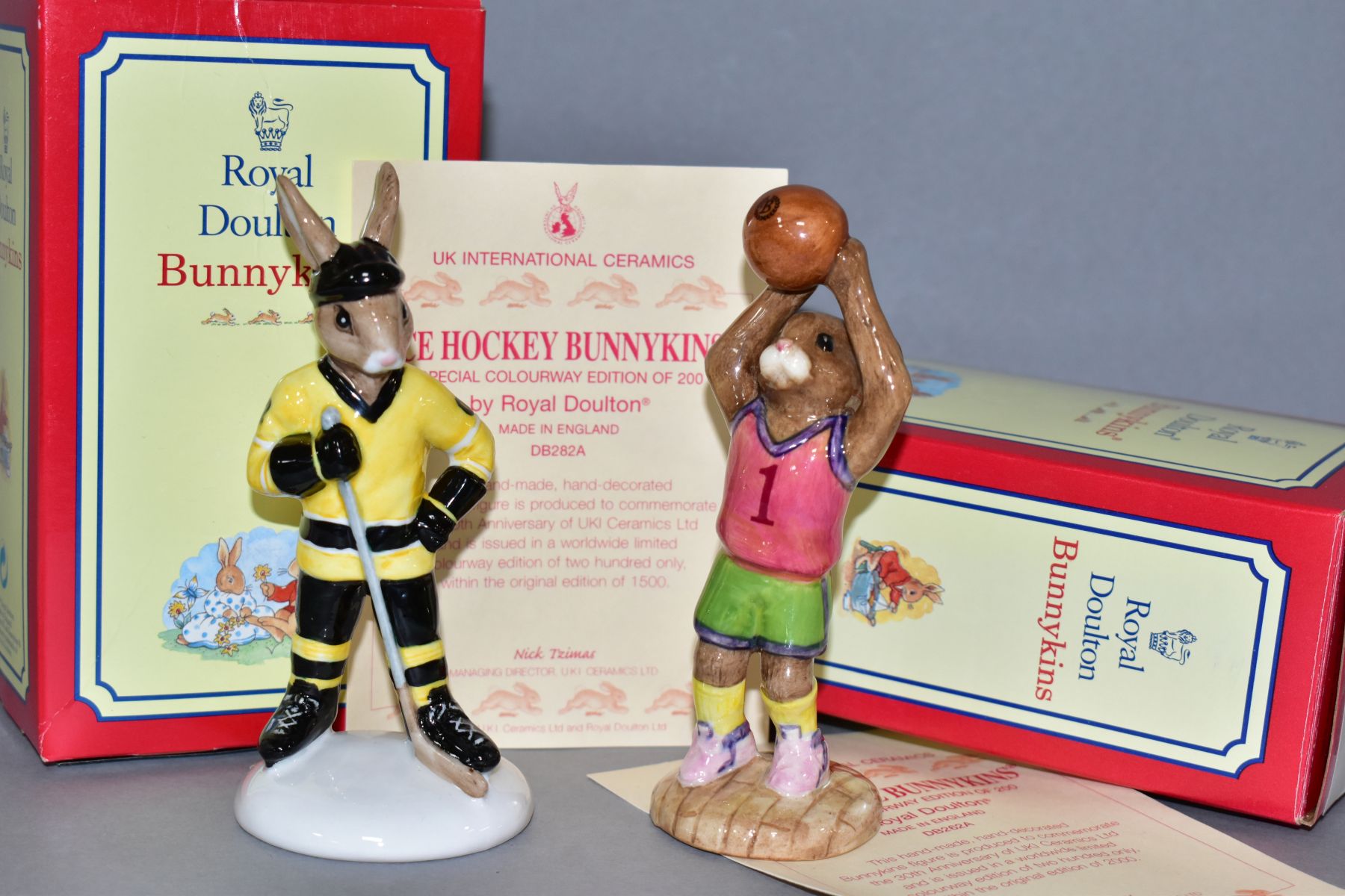 TWO BOXED ROYAL DOULTON SPECIAL COLOURWAY EDITIONS BUNNYKIN FIGURES, comprising Basketball DB262A no